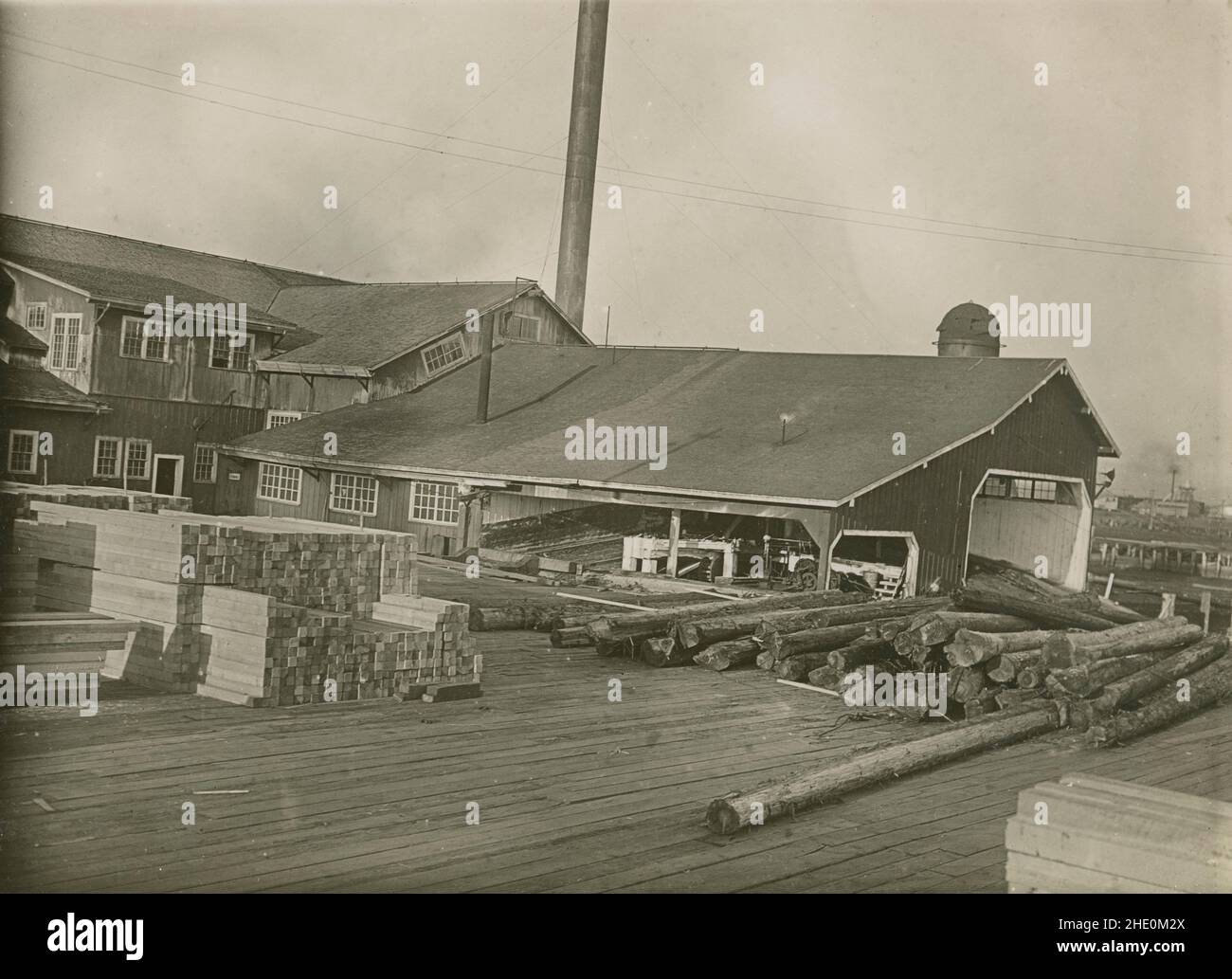 Antique circa 1930 photograph, lumber mill. Exact location unknown, USA