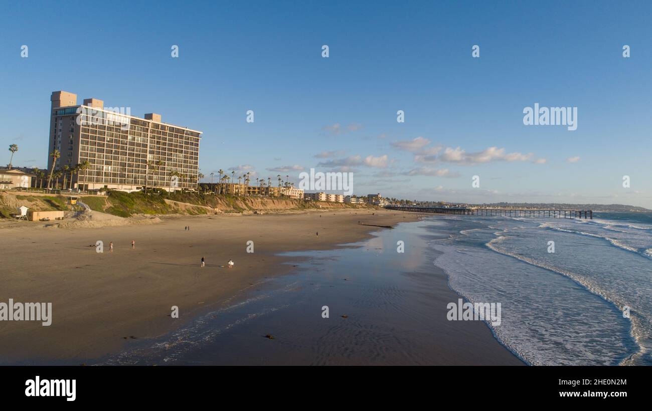 Condominium high rise along bluff on Pacific Beach, Crystal Pier in ...
