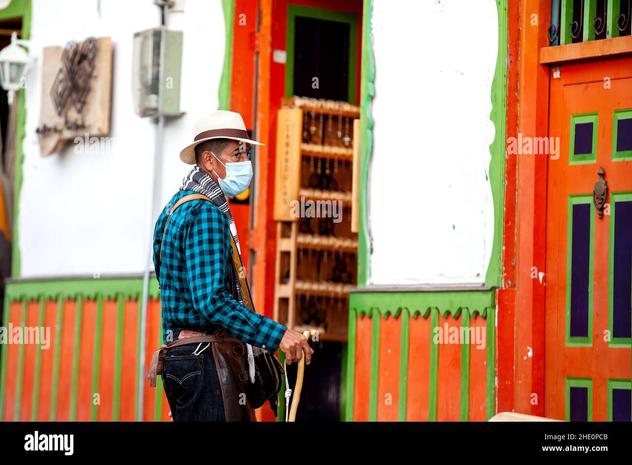 SALENTO, COLOMBIA - JULY 2021. Man dressed with the traditional outfit of the arrieros at the small town of Salento located at the region of Quindio i Stock Photo