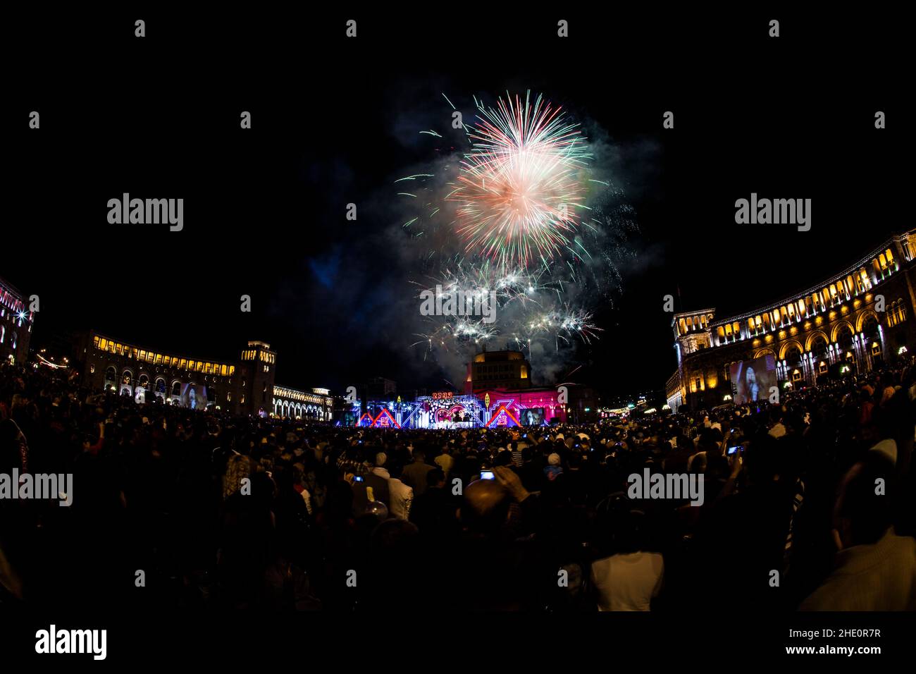 View of a festival and fireworks at the Republic Square at night