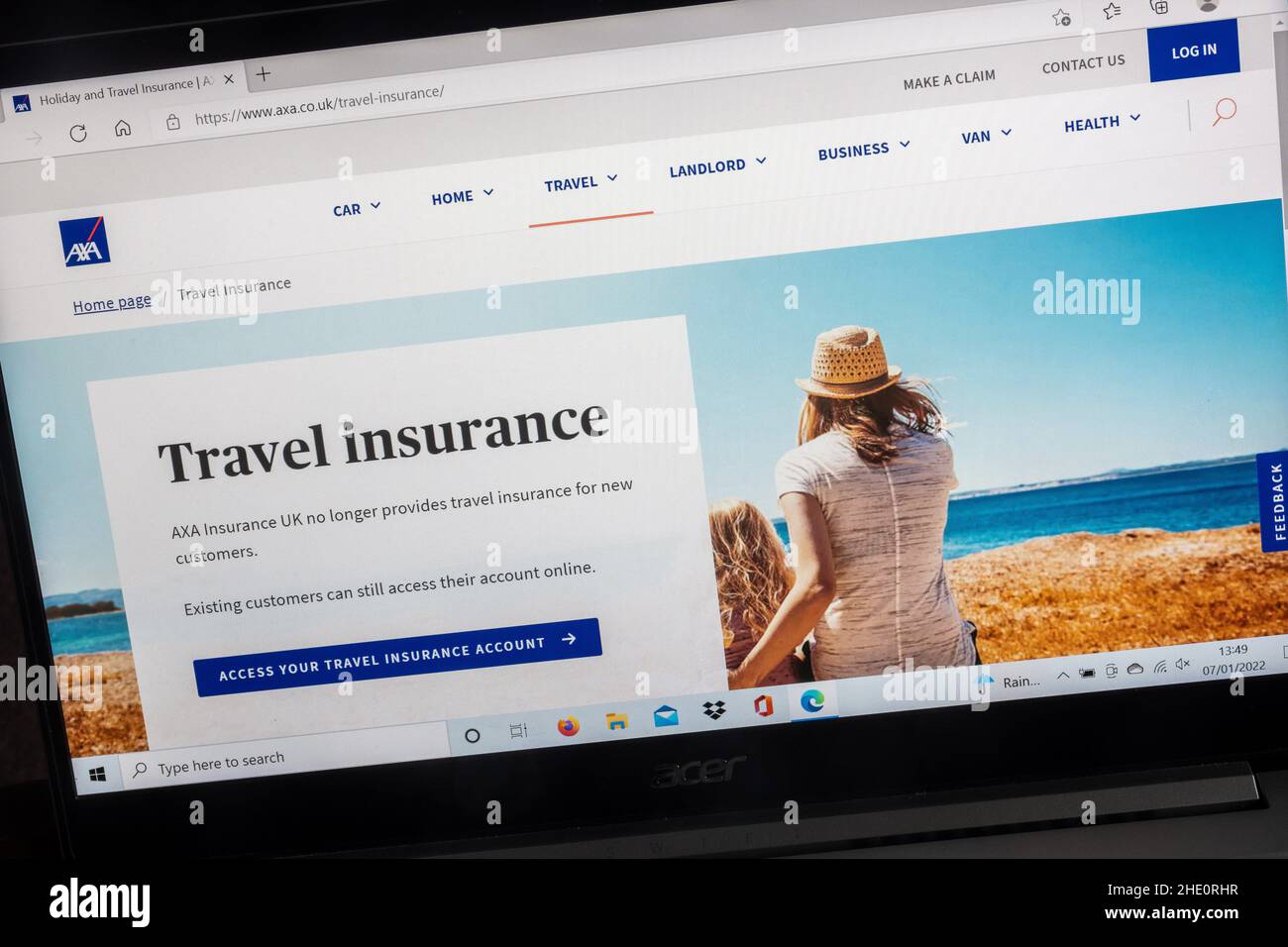 Axa Insurance Company on a laptop computer screen. Travel Insurance page. Stock Photo