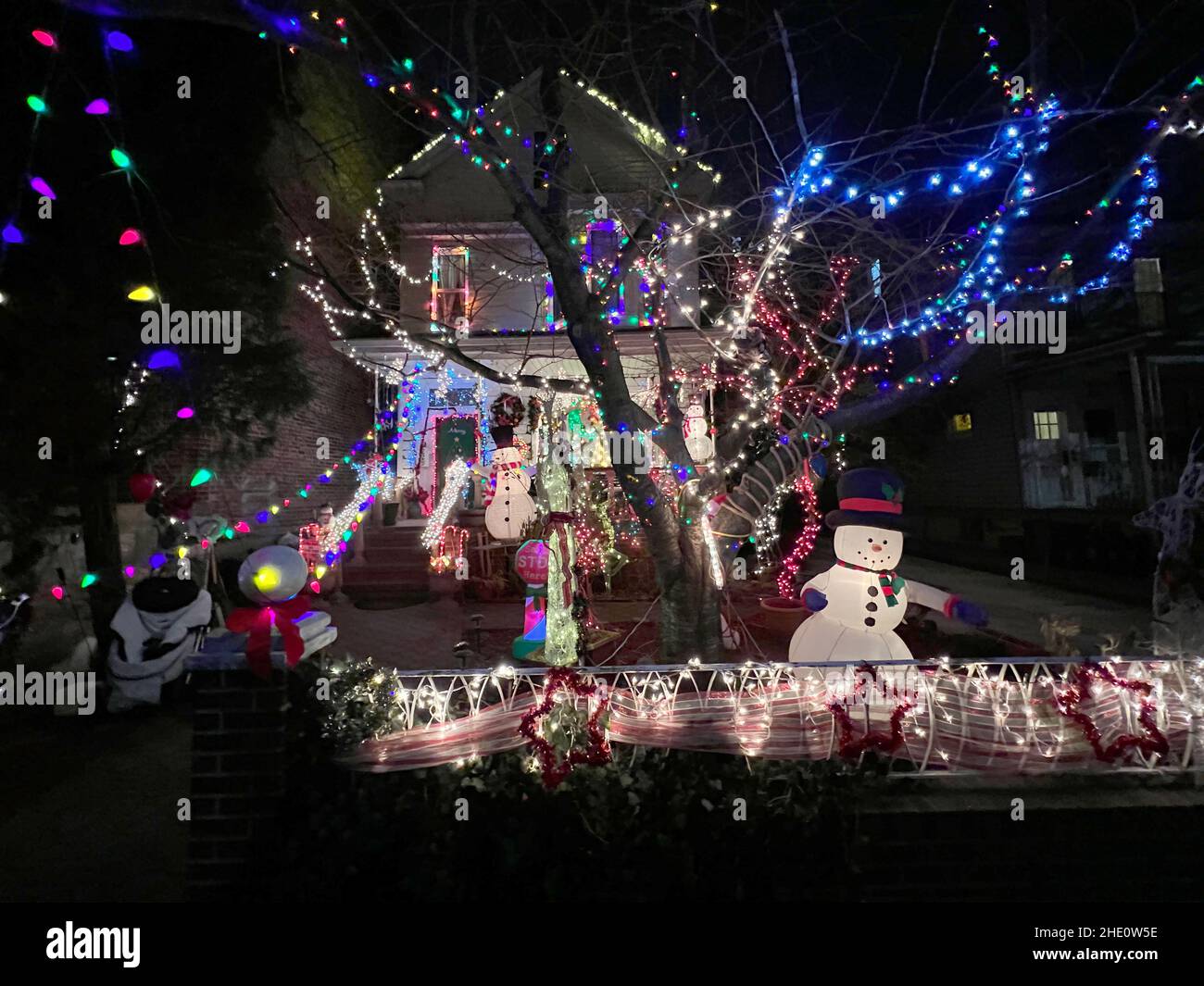 Celebrating the Christmas season of lights . Front yard, residential