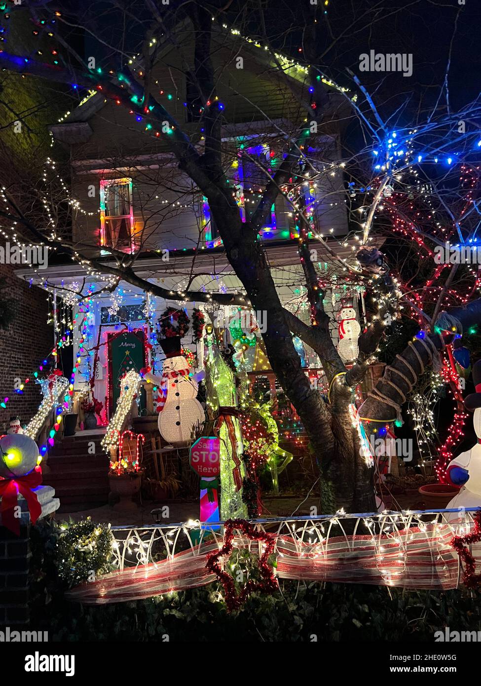 Celebrating the Christmas season of lights . Front yard, residential