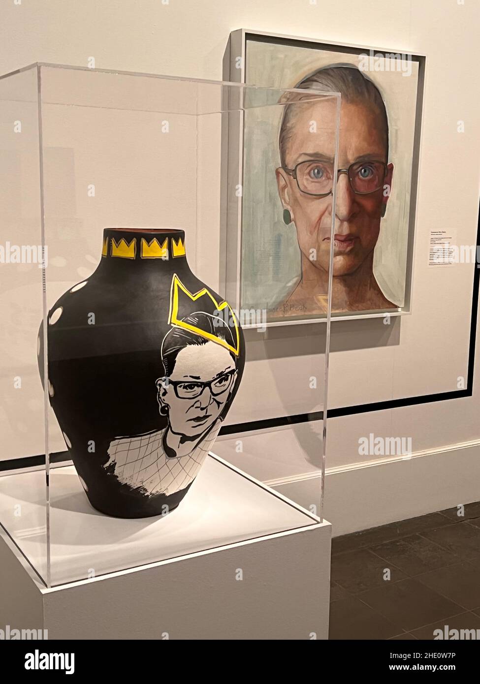 Painting and sculpture honoring Brooklyn born, Ruth Bader Ginsburg and her ongoing fight for justice throughout her career. Painting by Constance Peck Beaty; Vase by artist duo Crank takes a playful approach. emphasizing Ginsburg's broader popular culture appeal. Stock Photo