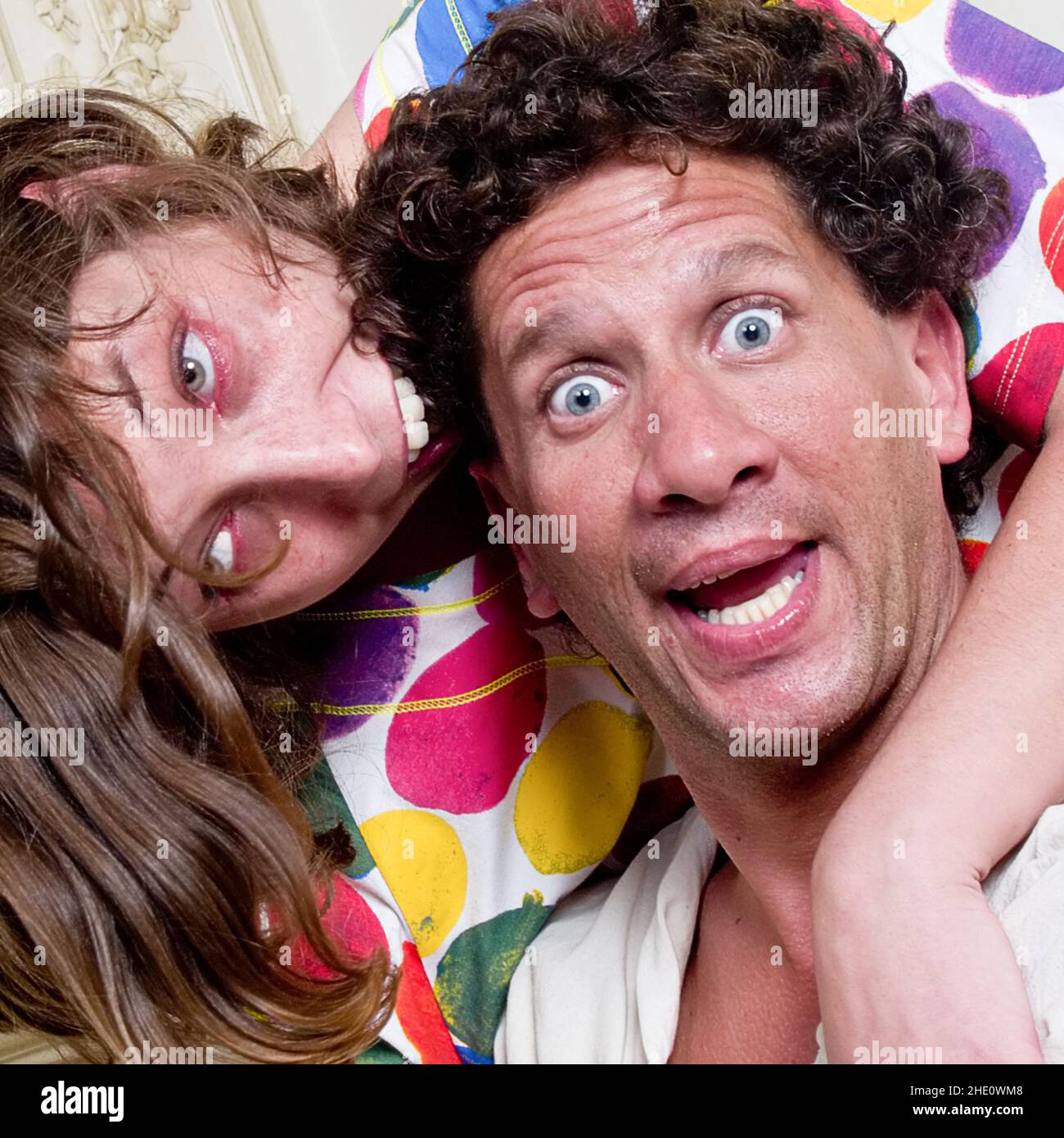 Model couple  posing , acting crazy in an institutional setting Stock Photo