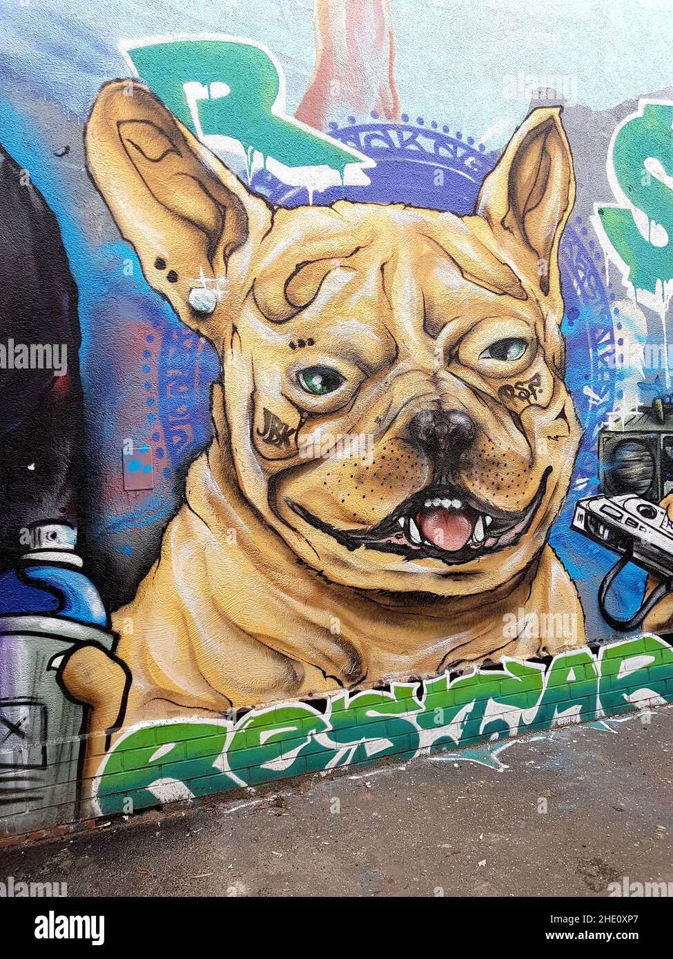 Vertical shot of a dog street art mural in Konin, Poland Stock Photo
