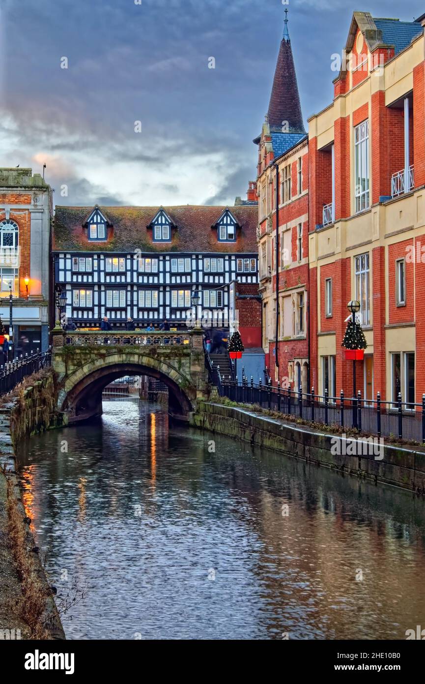 UK, Lincolnshire, Lincoln, High Bridge over the River Witham, Stokes Tea and Coffee Shop with the Waterside Shopping Centre on the right hand side. Stock Photo