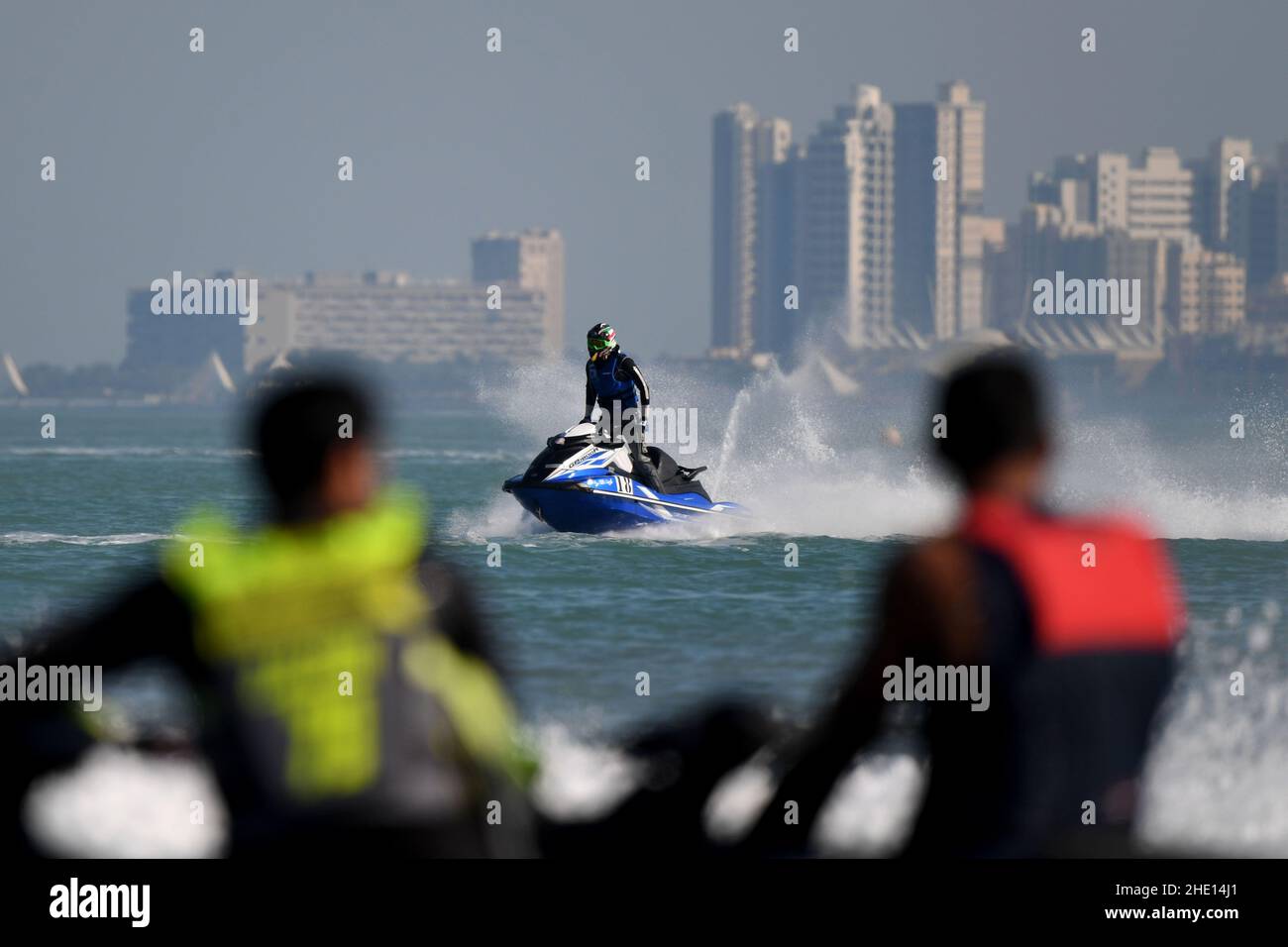 Kuwait City, Kuwait. 7th Jan, 2022. Faisal Taha Burbea (C) competes