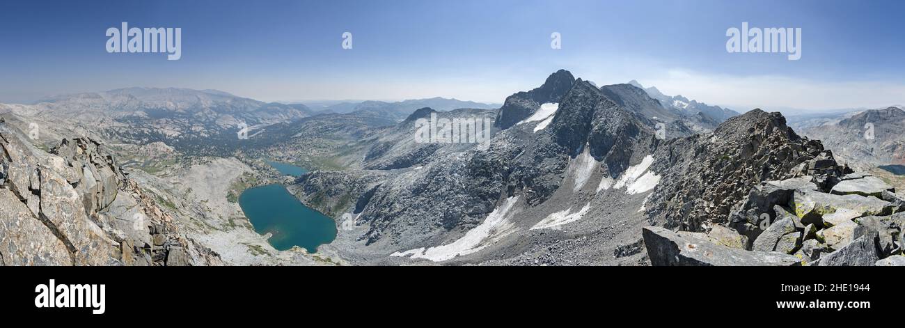 panorama from Davis Lakes Peak overlooking the Ansel Adams Wilderness in the Sierra Nevada Mountains of California with wildfire smoke haze Stock Photo