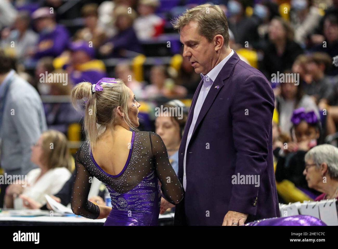 Baton Rouge, LA, USA. 07th Jan, 2022. LSU Head Coach Jay Clark speaks with one of his athletes, Reagan Campbell, after her balance beam routine during NCAA Gymnastics action between Centenary and Baton Rouge, LA, USA. 07th Jan, 2022. LSU Head Coach Jay Clark speaks with one of his athletes, Reagan Campbell, after her balance beam routine during NCAA Gymnastics action between Centenary and
