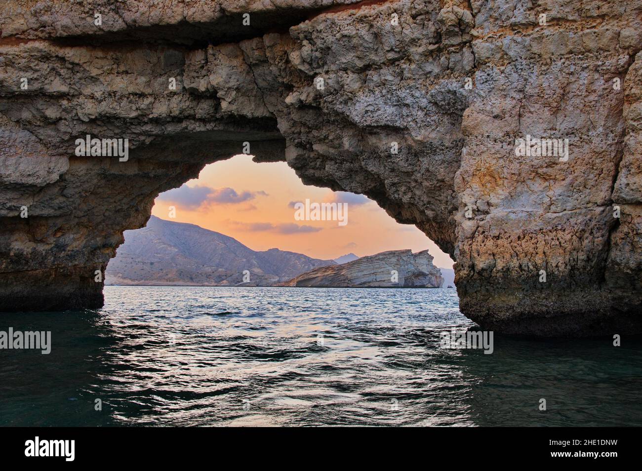 Views Through Rocks View through the hole in the rock during sunset Stock Photo - Alamy