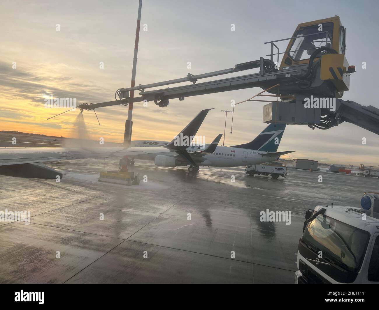 Calgary, Alberta, Canada December 7, 2021 Westjet planes in Calgary YYC airport. The airport