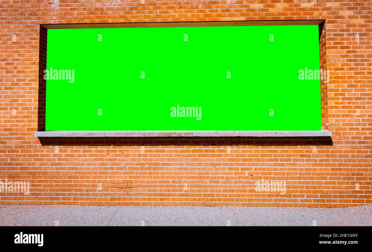 Brick Wall with Green Screen window Stock Photo Alamy