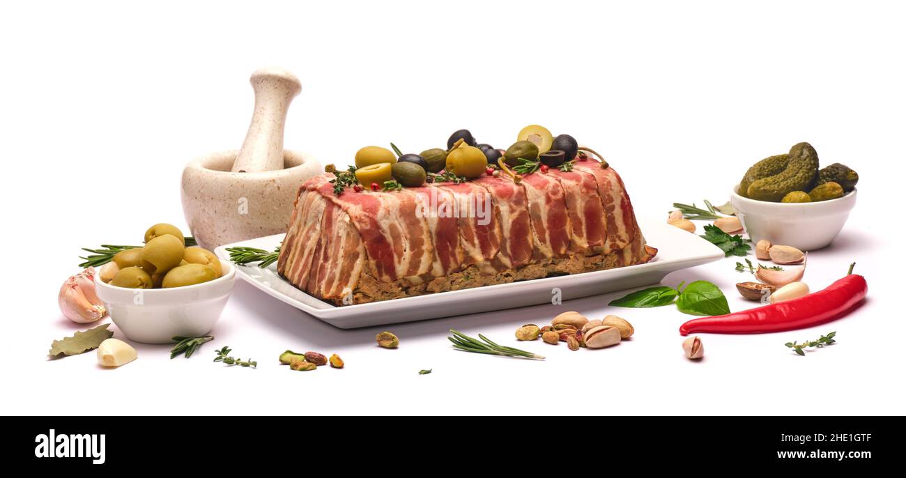 Traditional French terrine covered with bacon isolated on white