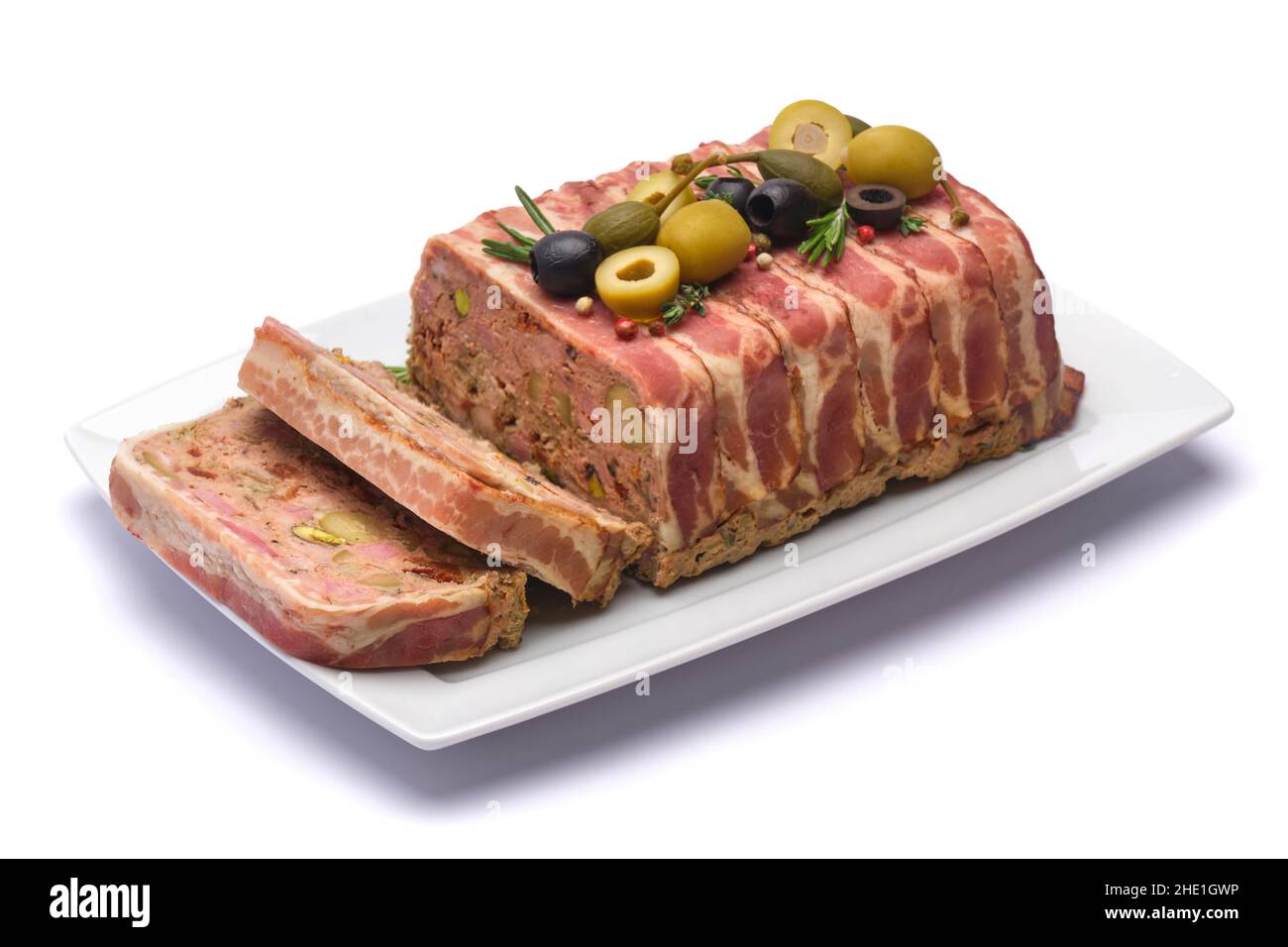 Traditional French terrine covered with bacon isolated on white