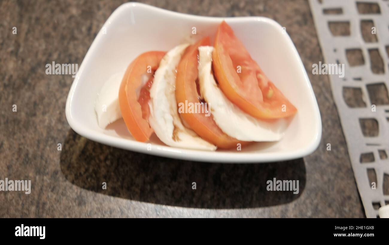 Tomato and Mozzarella Salad Appetizers Side Dish Stock Photo