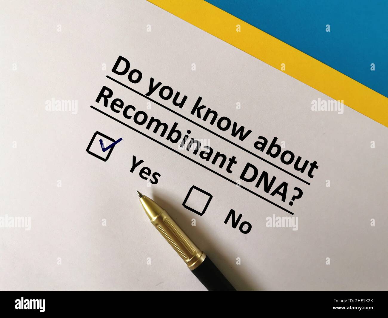 One person is answering question about vaccines. He knows about recombinant DNA. Stock Photo