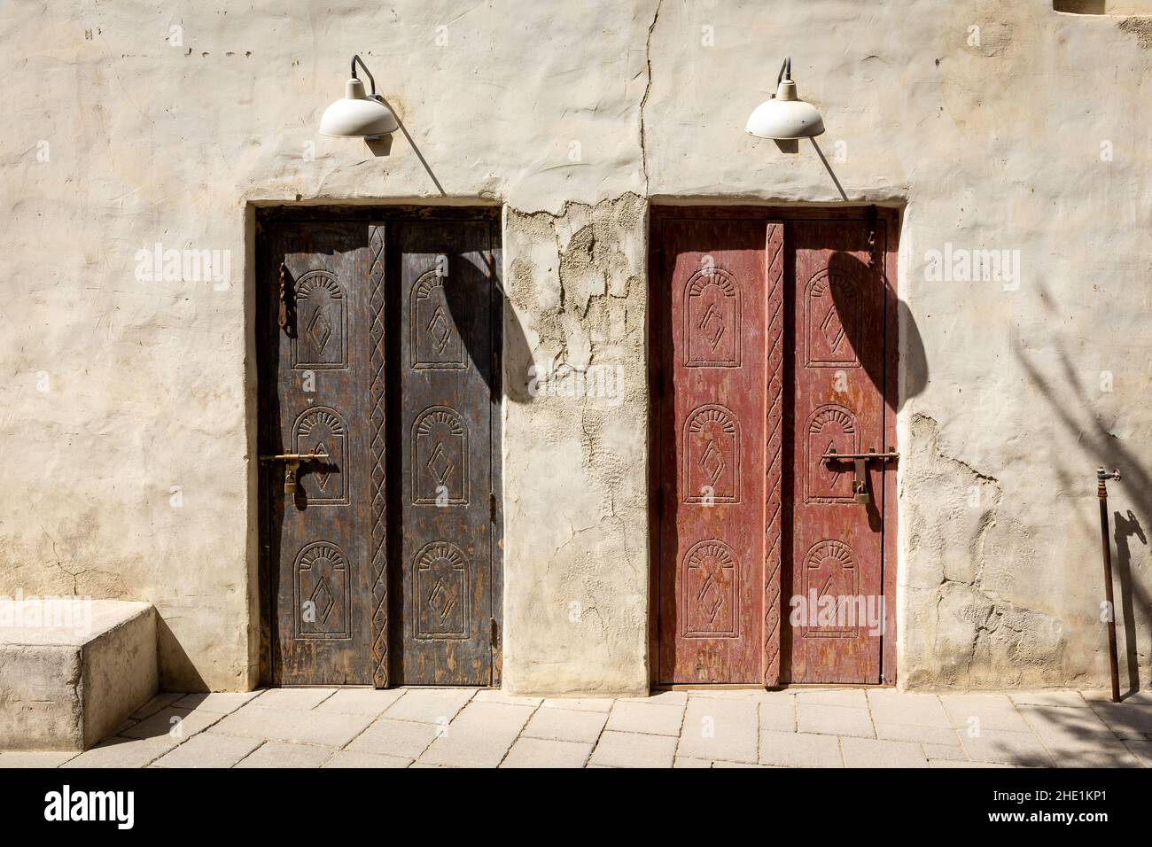 Arabic style carved wooden doors in Al Fahidi Historical District, Deira, Dubai, United Arab Emirates. Stock Photo