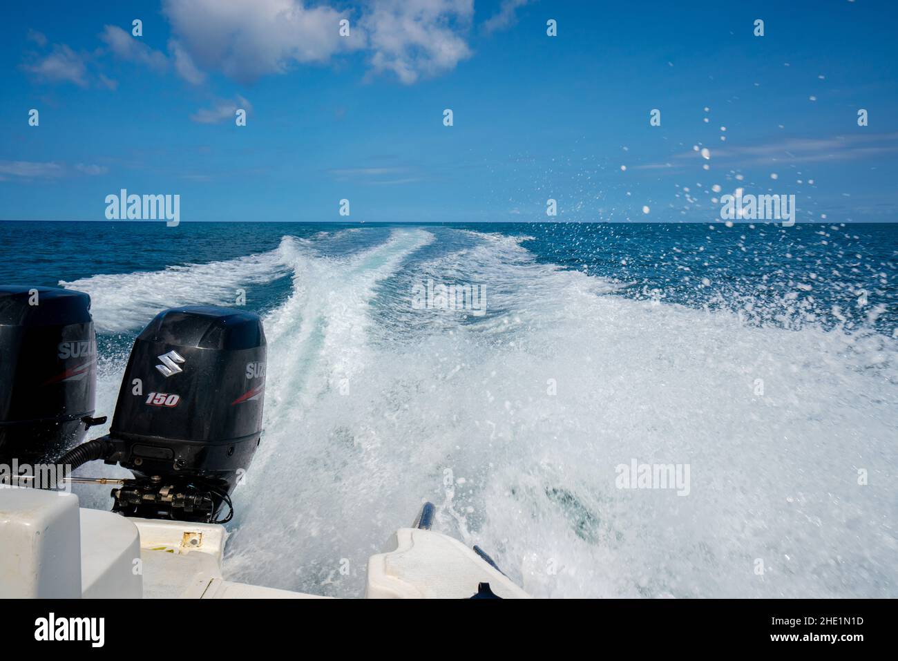 Speed boat on the Indian Ocean off the coast of Mauritus Stock Photo