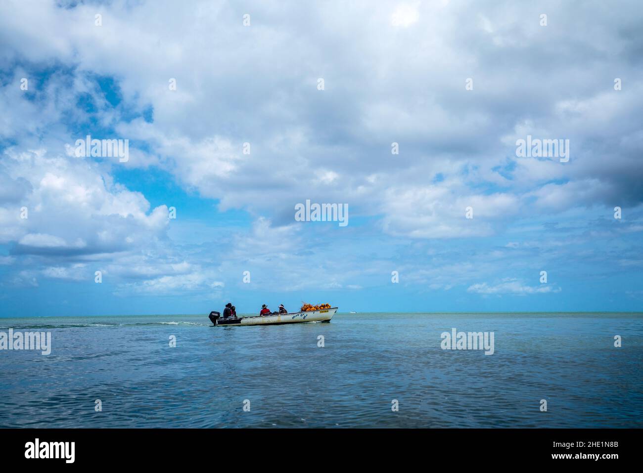 Boat in the lagoon that surrounds Mauritius island Stock Photo