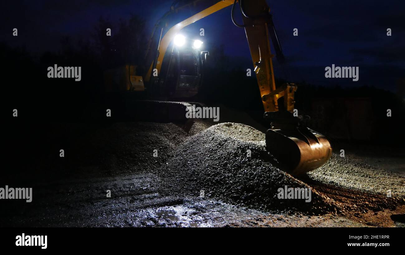 Llangennech train crash site, at night a digger working to create a path to the crash Stock Photo