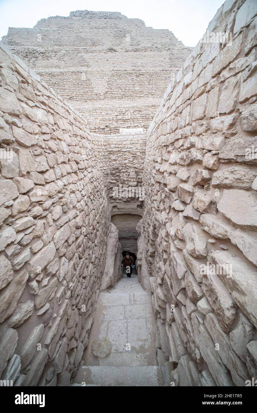 A stone passageway leading to a tunnel underneath the step pyramid of Djoser in Saqqara, Egypt. Stock Photo