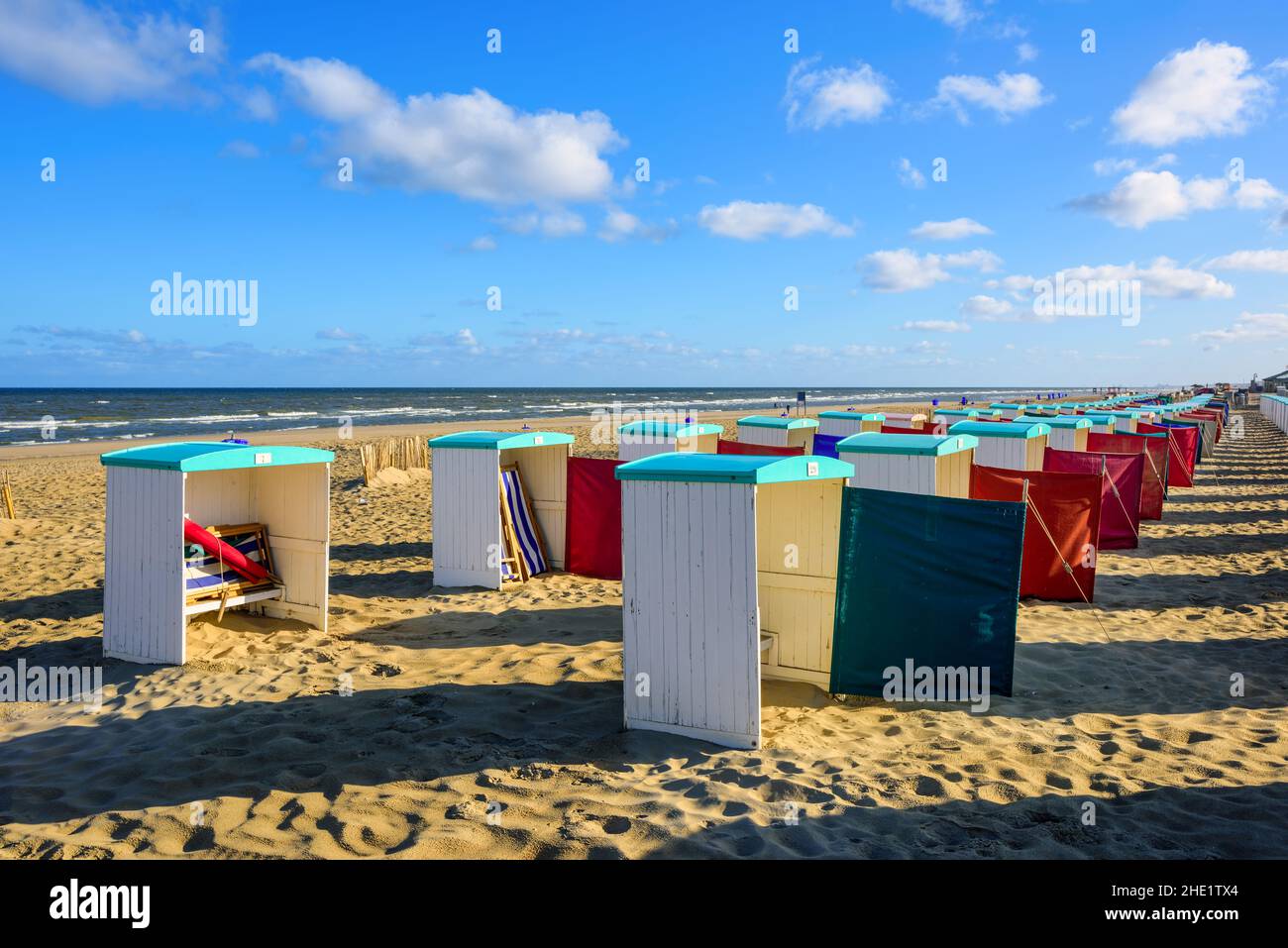 Beach huts on an Atlantic ocean coast sand beach by Katwijk aan Zee, South Holland, Netherlands Stock Photo