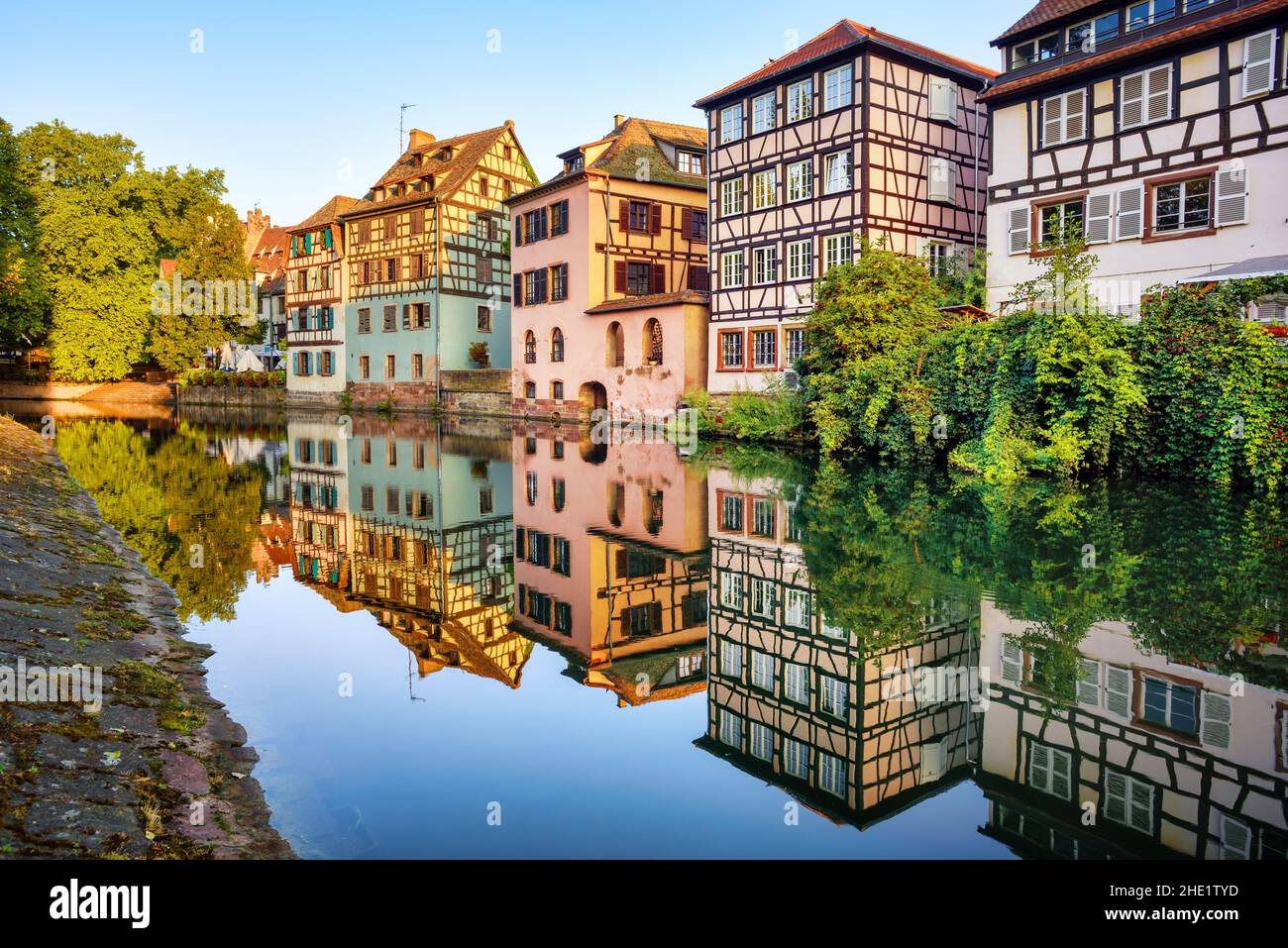 Traditional colorful half-timbered houses on Ill river in the Old town of Strasbourg city, Alsace, France Stock Photo