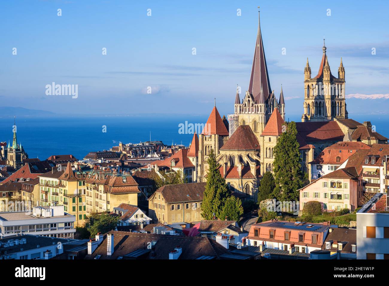 Lausanne city, view of the historical gothic Cathedral, Old town roofs and Lake Geneva, Switzerland Stock Photo