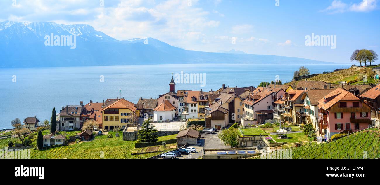 Chexbres village in Lavaux vineyard terraces, Lausanne, Switzerland, panoramic view to Lake Geneva and Alps mountains. Lavaux is famous for its scenic Stock Photo