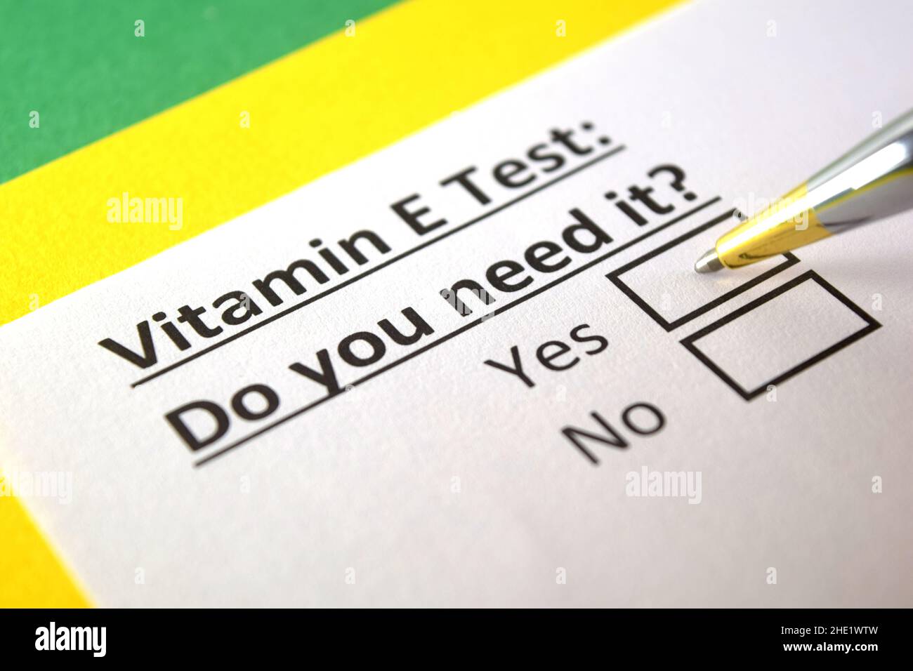 One person is answering question about vitamin e test Stock Photo Alamy