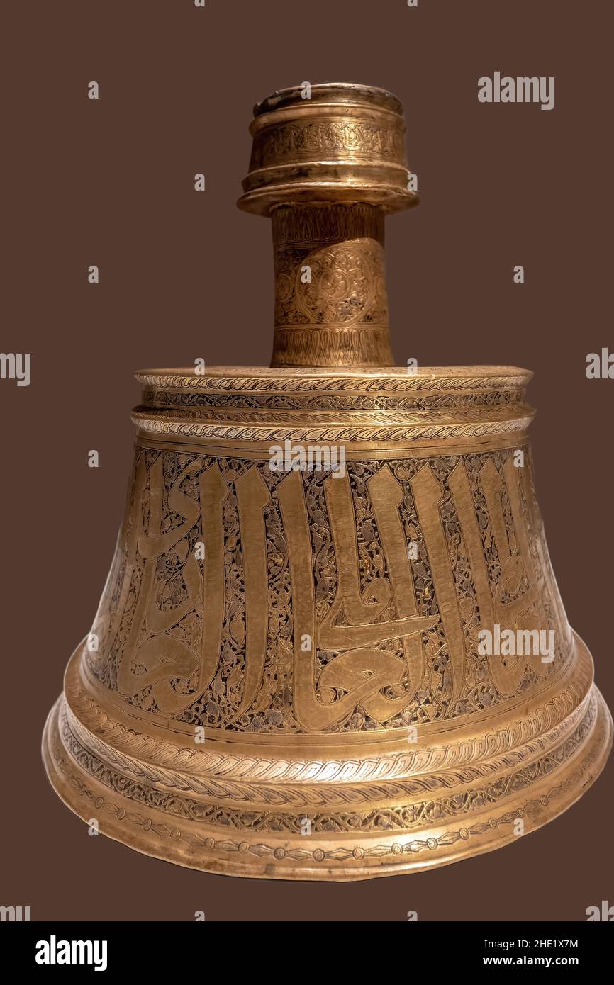 Brass candlestick with Arabic inscriptions. The Aga Khan Museum is a museum of Islamic art, Iranian art and Muslim culture.Jan. 8, 2022 Stock Photo