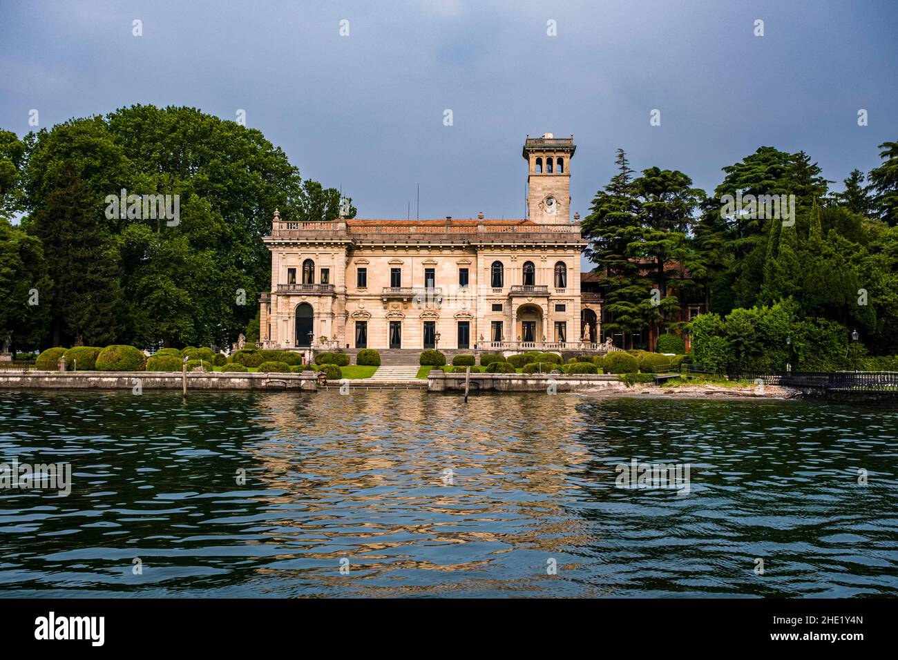 View of Villa Erba, a 19th-century villa  in the suburb Cernobbio, across Lake Como from a ferryboat. Stock Photo