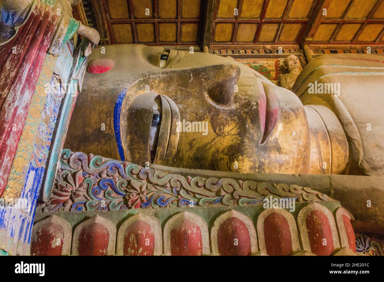 ZHANGYE, CHINA - AUGUST 23, 2018: Reclining Buddha in Giant Buddha Dafo Temple in Zhangye, Gansu Province, China Stock Photo