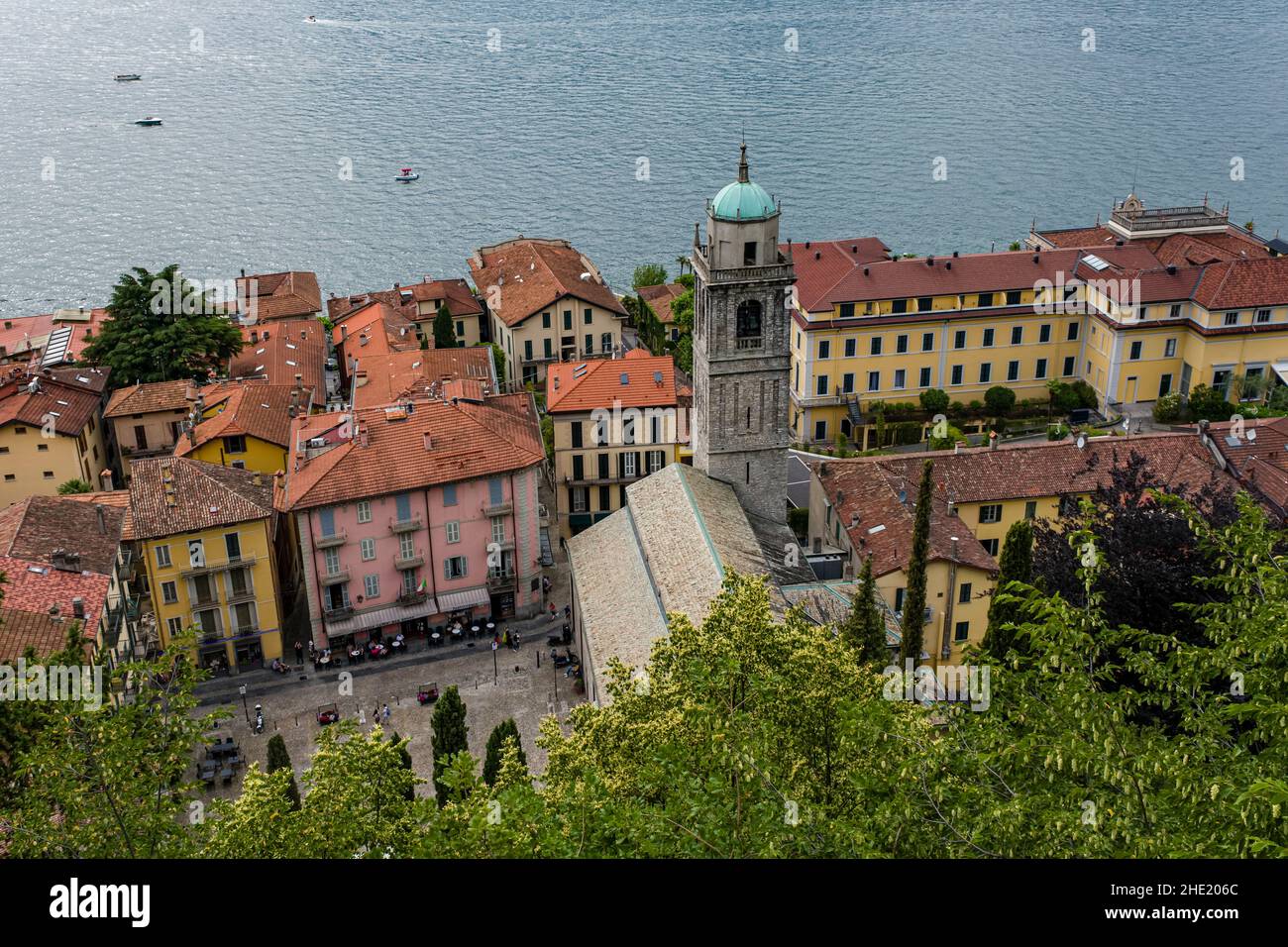 Aerial view of town, including the Basilica of St. Giacomo, and Lake Como. Stock Photo