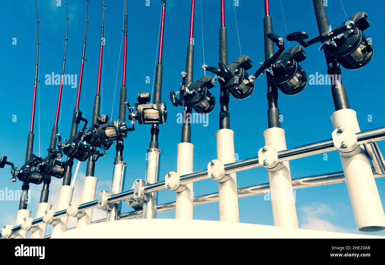 Fishing trolling boat rods in rod holder. Big game fishing