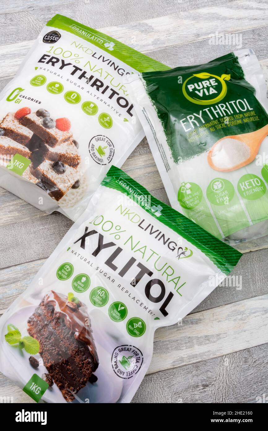 Plastic packets of the natural sucrose sugar alternatives Erythritol & Xylitol. Used by weight watchers, diabetics, in sweets, and keto diets. Stock Photo