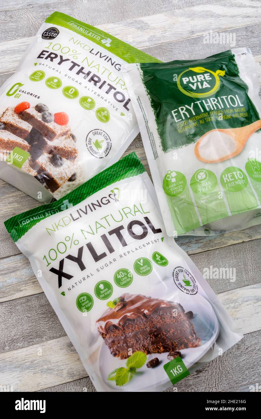 Plastic packets of the natural sucrose sugar alternatives Erythritol & Xylitol. Used by weight watchers, diabetics, in sweets, and keto diets. Stock Photo