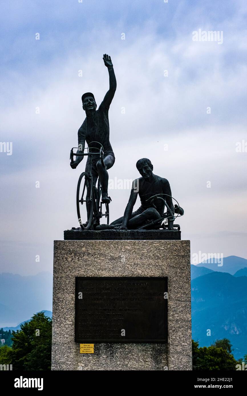 The monument Fallen Cyclist at Passo Ghisallo on the hill Madonna del Ghisallo. Stock Photo
