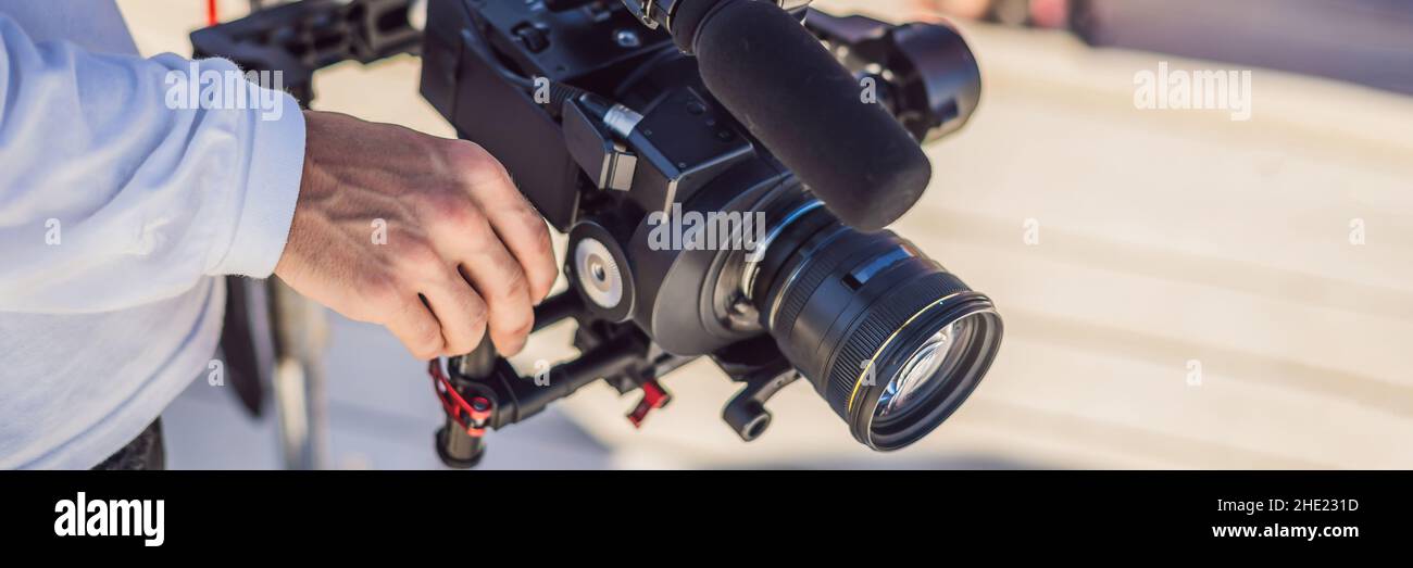 Professional steadicam operator uses a 3axis camera stabilizer system
