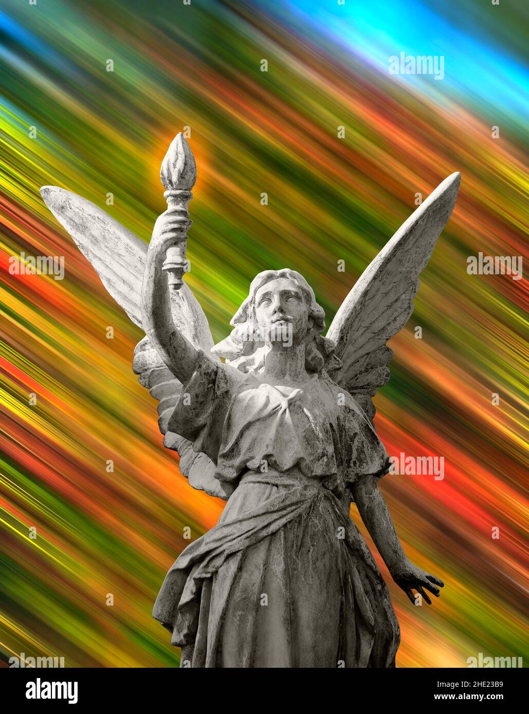 Statue is holding a torch that has an aura around it. Stock Photo