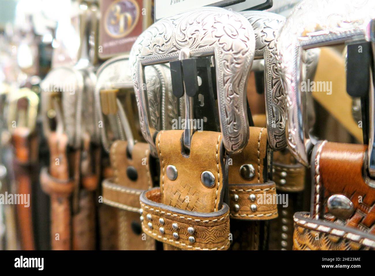 Belts in a United States western wear store Stock Photo