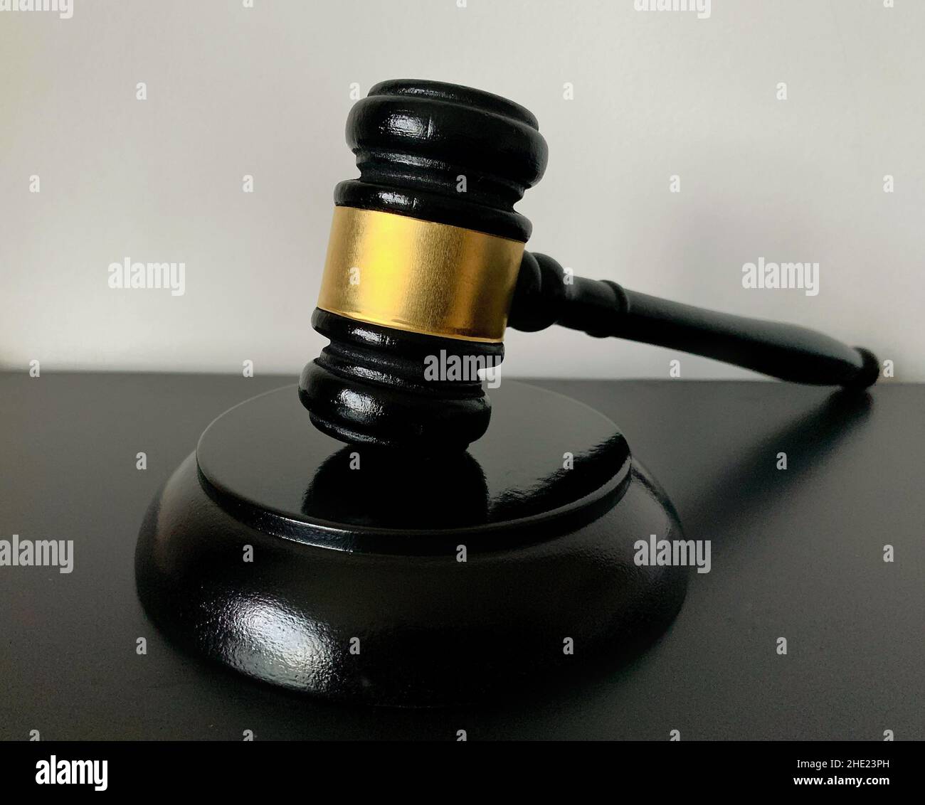Close up of judge gavel on dark table background. Law and justice concept Stock Photo