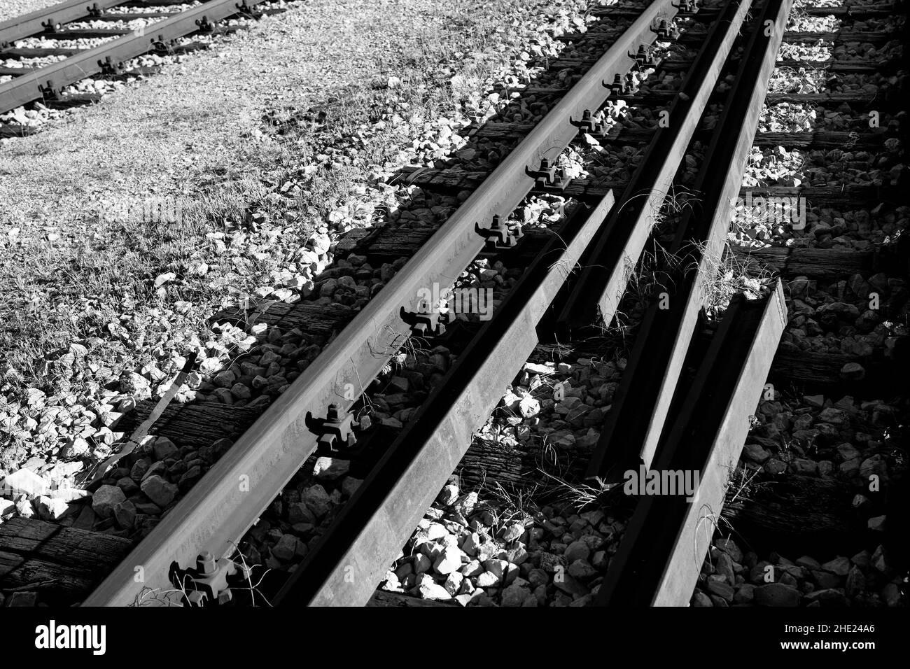 Dramatic railroad scene with some broken tracks. Stock Photo