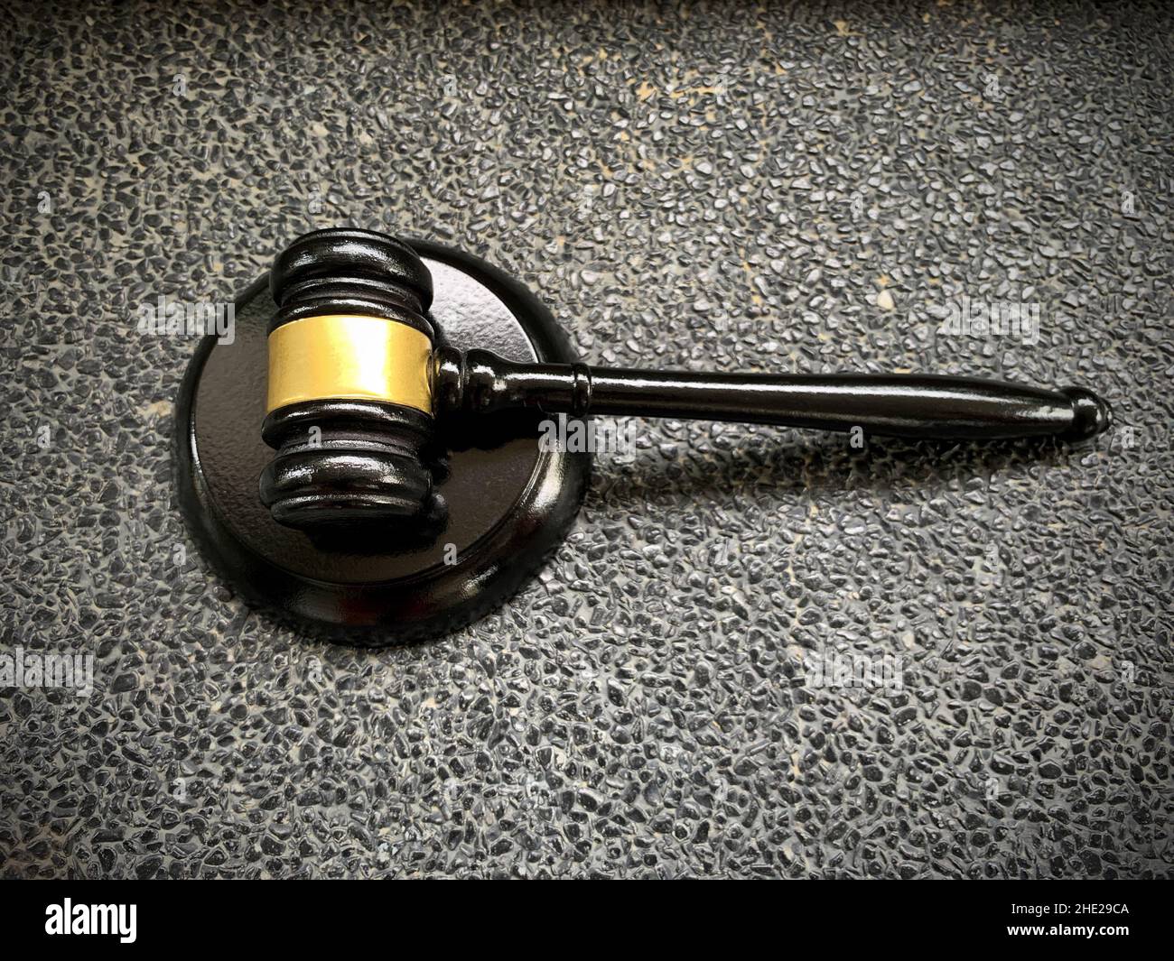 Law and justice concept - judge gavel on black marble background. Stock Photo
