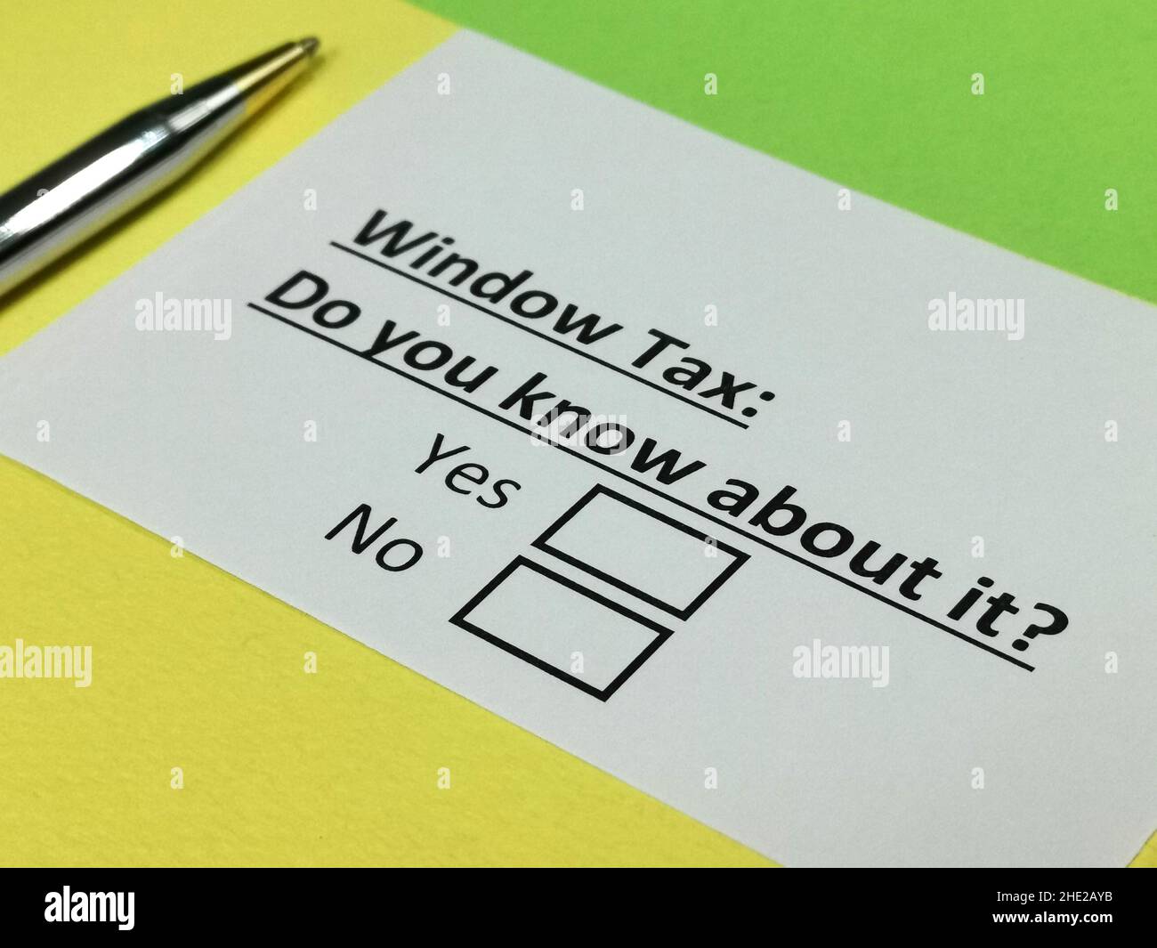 One person is answering question about window tax. Stock Photo