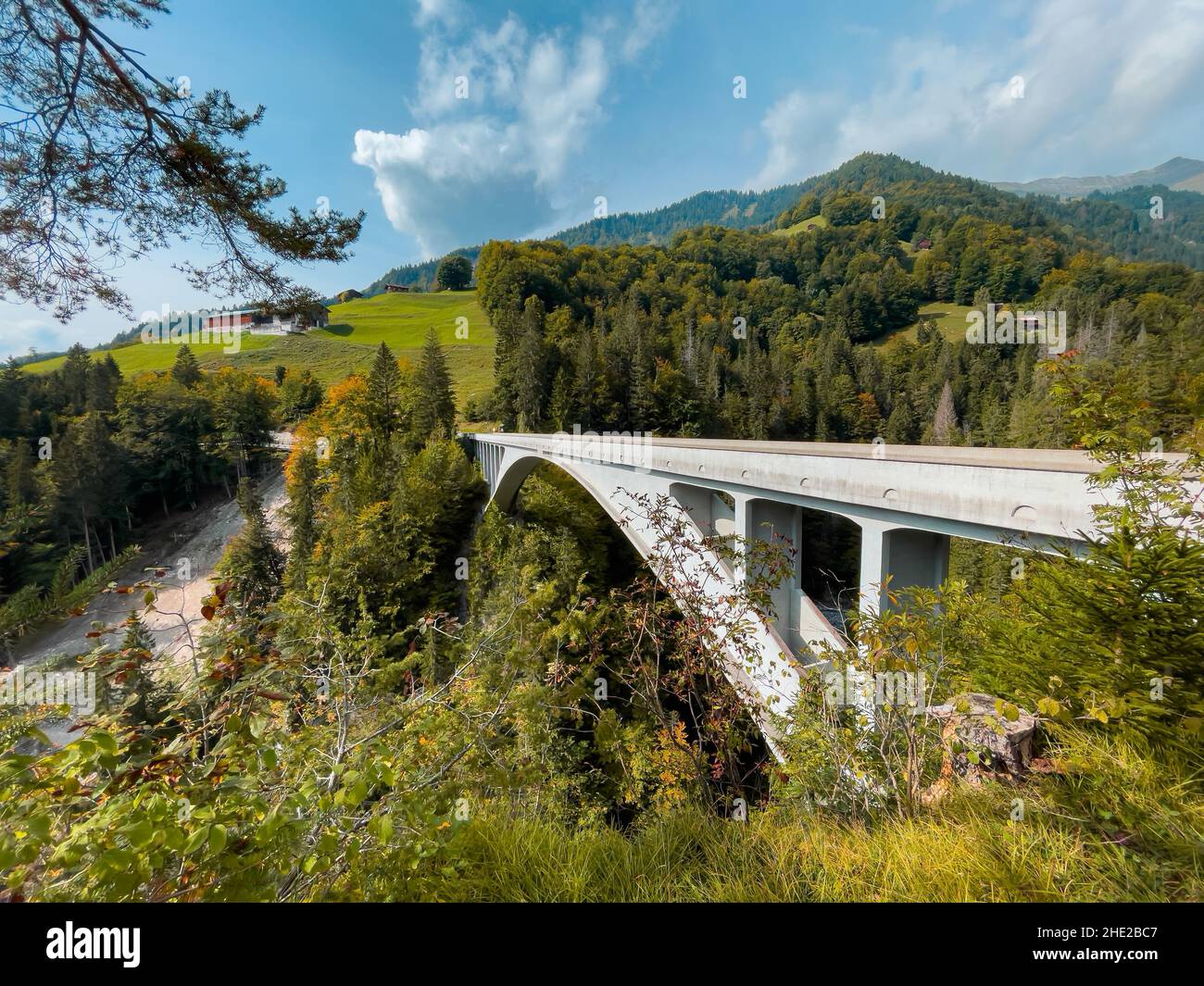 Schiers, Switzerland - September 27, 2021: Famous international historic civil engineering landmark Salginatobel bridge, reinforced concrete arch brid Stock Photo