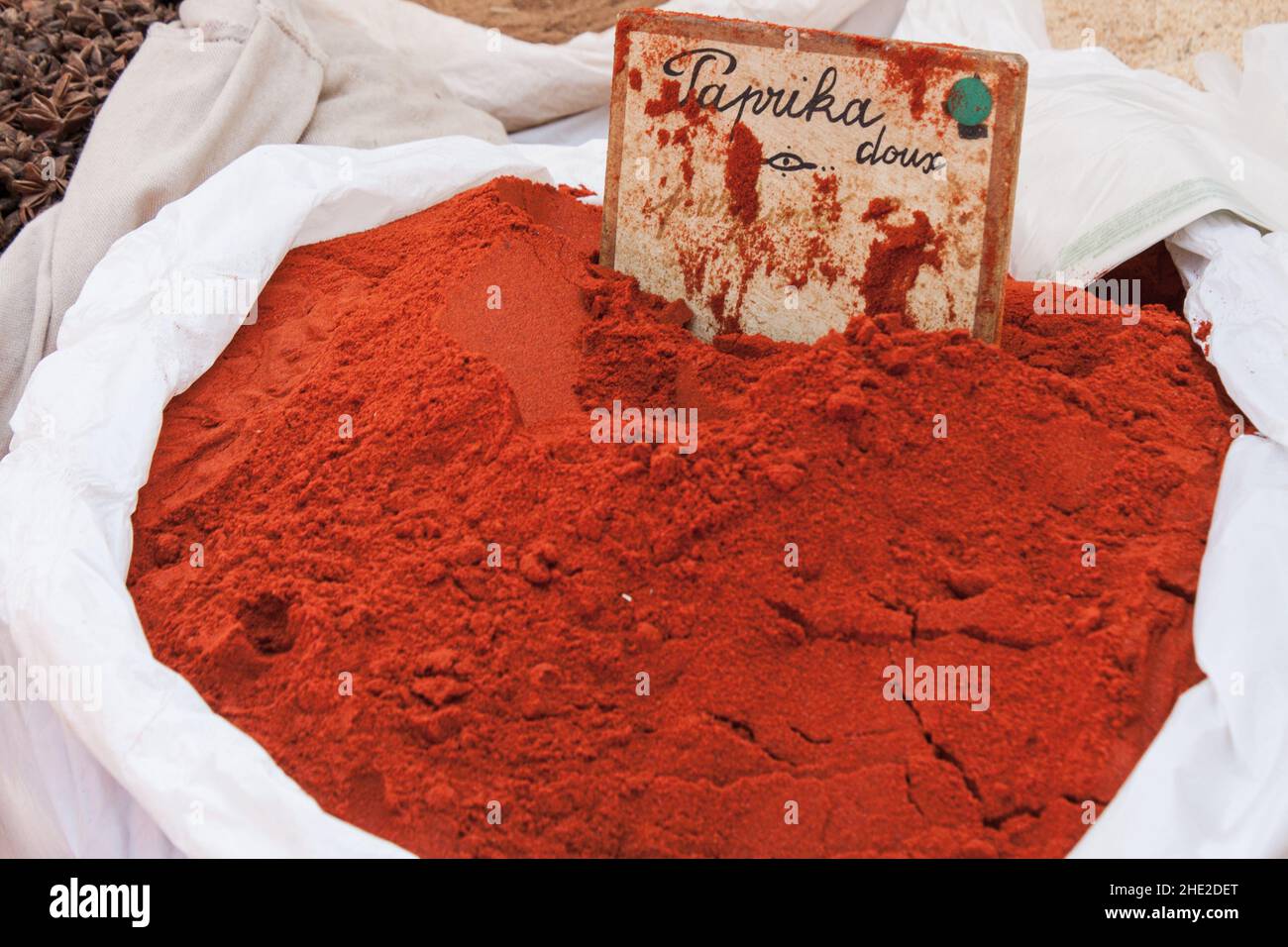 Paprika powdering a big bag on a market Stock Photo Alamy