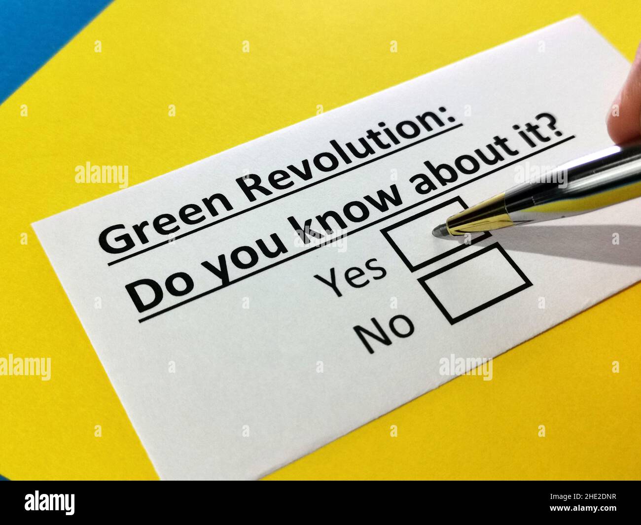 One person is answering question about green revolution Stock Photo - Alamy