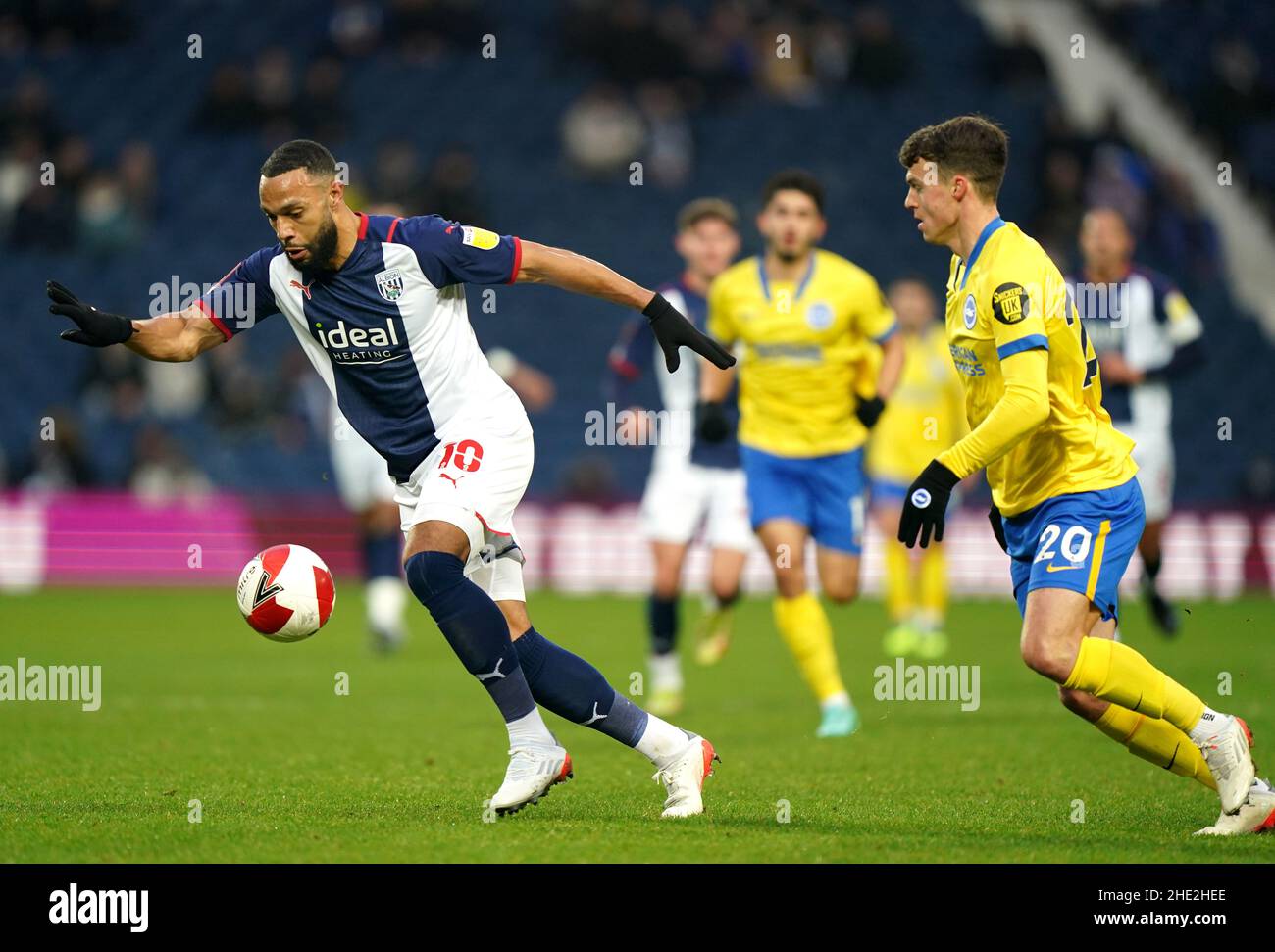 West Bromwich Albion's Matt Phillips (left) and Brighton and Hove Albion's Solly March battle for the ball during the Emirates FA Cup third round match at The Hawthorns, West Bromwich. Picture date: Saturday January 8, 2022. Stock Photo